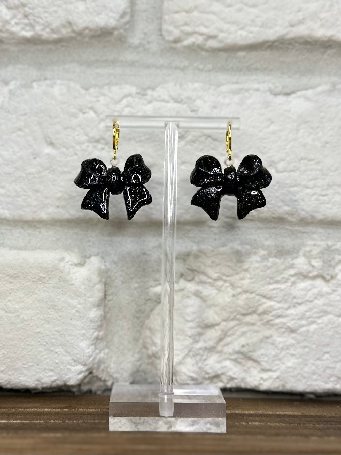 Black and gold sparkle bow