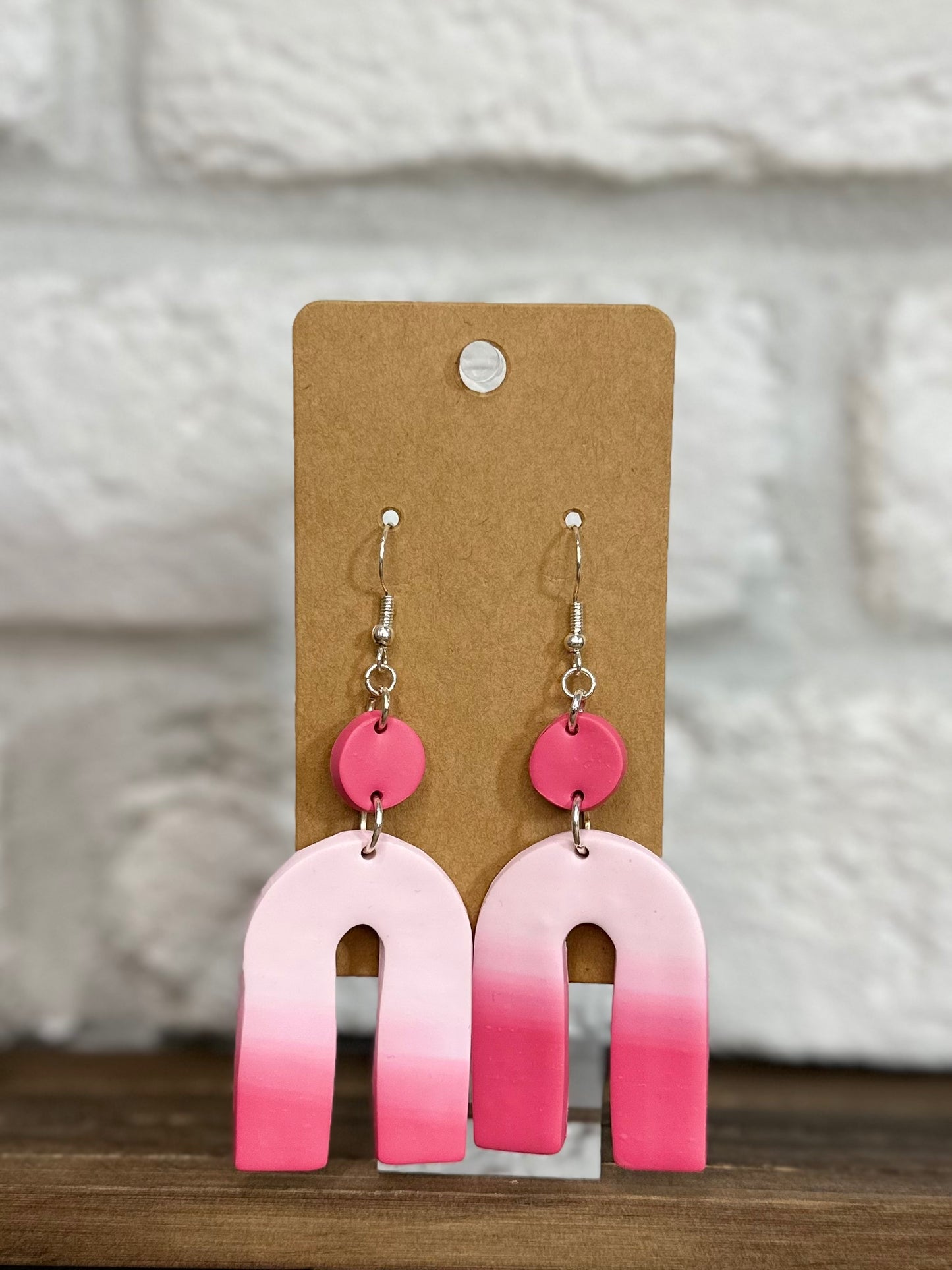 Pink gradient rainbow shape