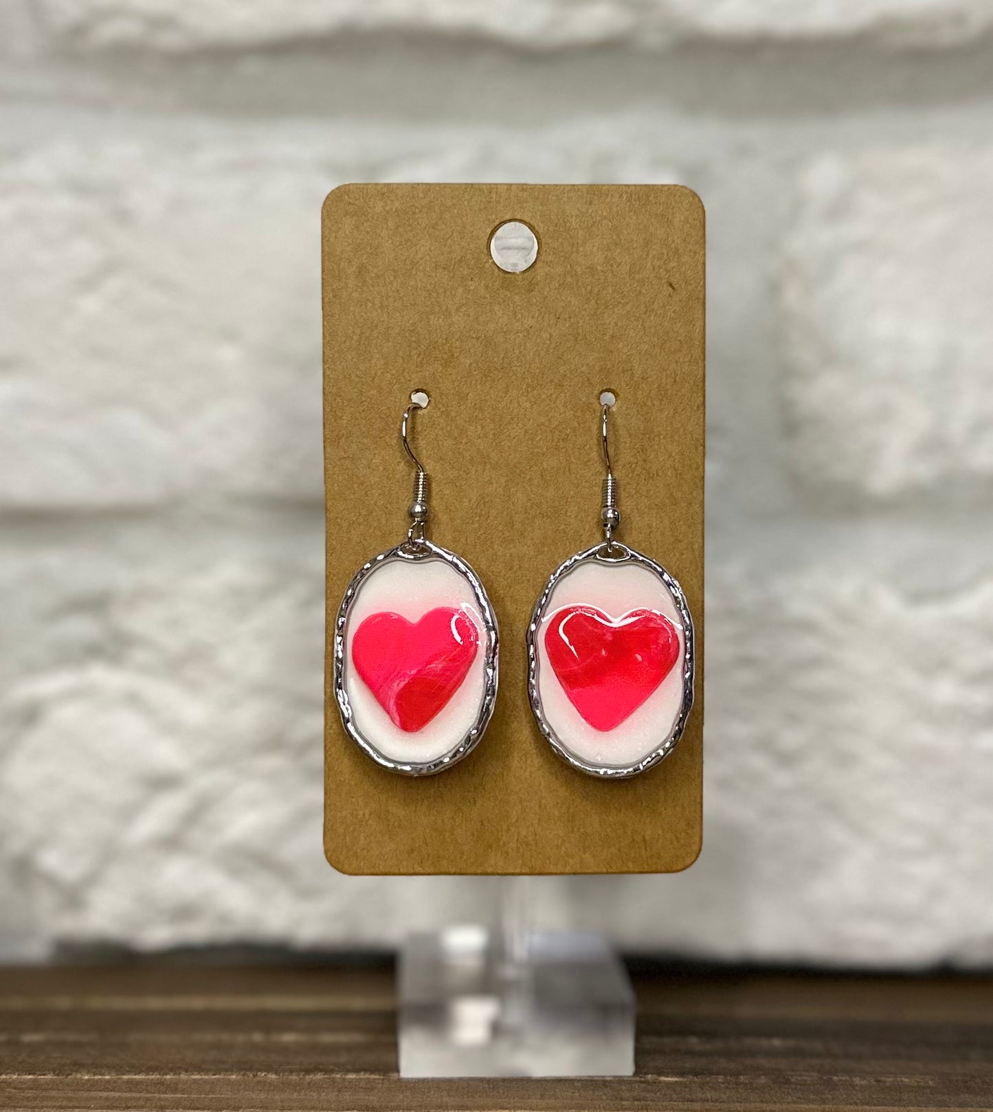 Silver oval heart white background