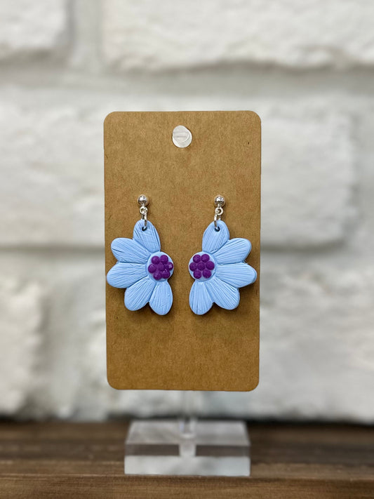 Blue daisy purple center