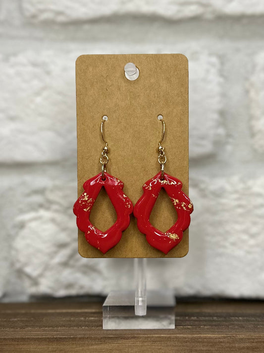 Red w/ gold flecks frame
