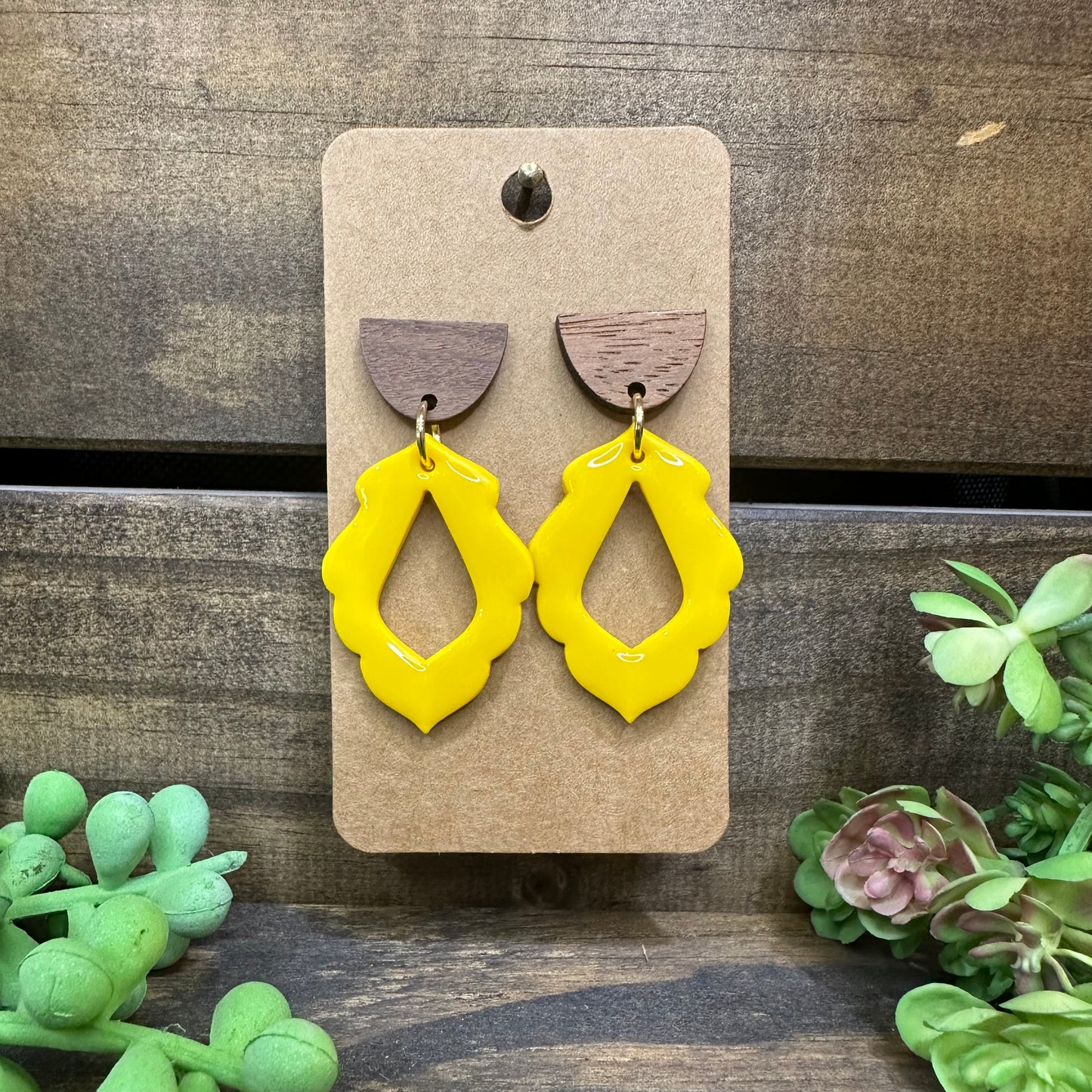 Yellow flourish frame with wooden stud