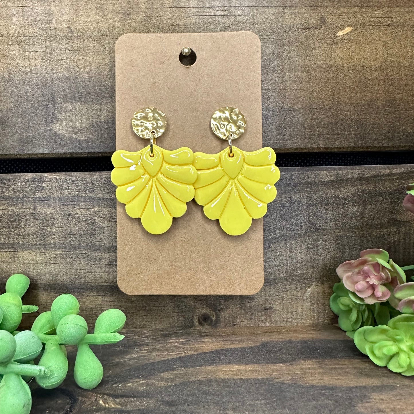 Yellow flourish with gold stud